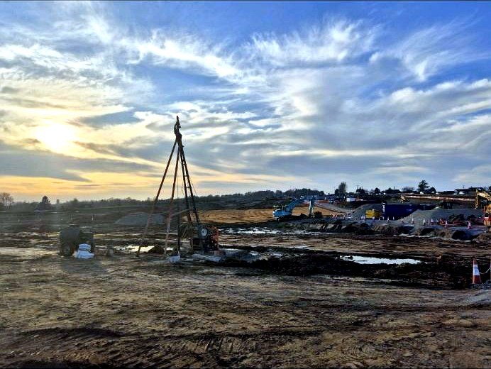 Cable percussion rig on a site at sunset