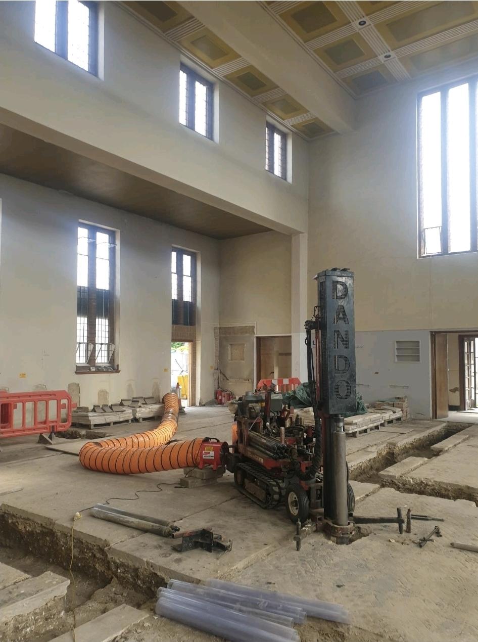 Tracked Dando window sample rig working inside a building